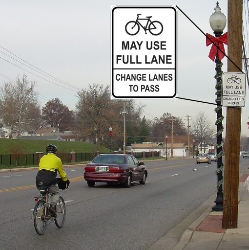 New street signs in Ferguson reflect greater lane leeway for cyclists. Credit: Martin Pion 